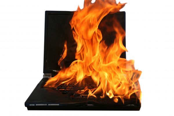 Laptop on fire representing Ottawa Computer Fire