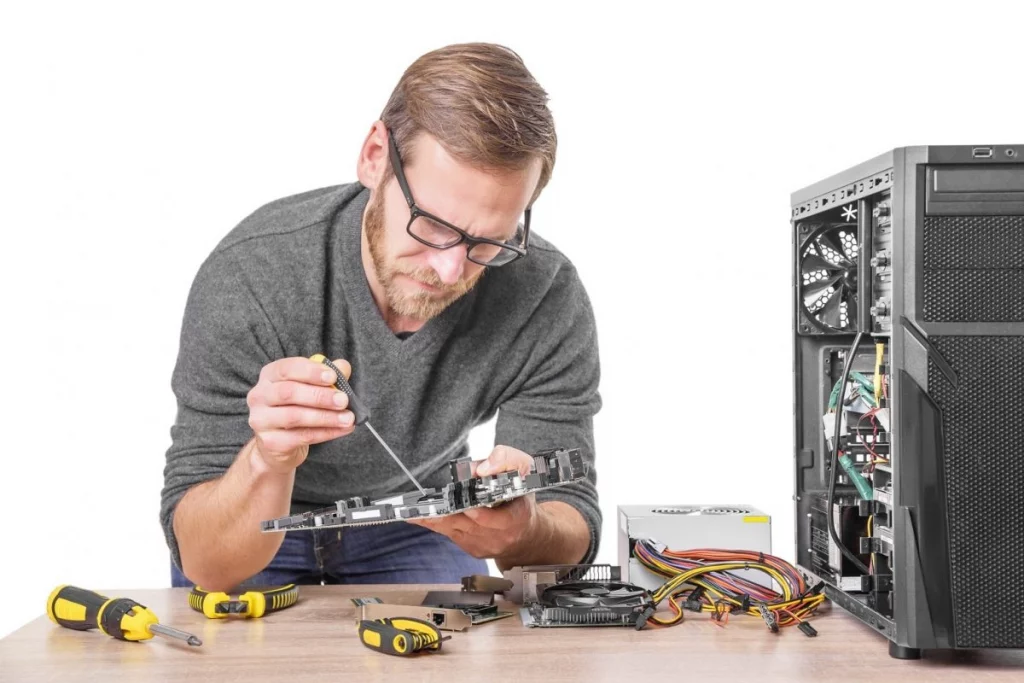 onsite computer repair technician working on pc repair